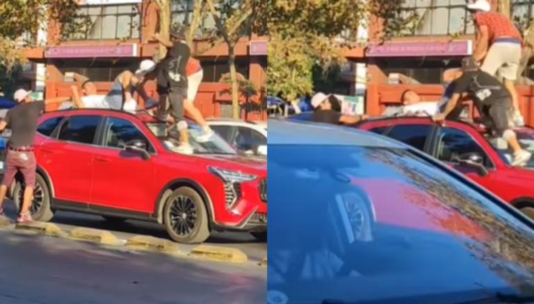 Impactante pelea en la Alameda: Tres hombres golpean a sujeto sobre un auto en plena calle
